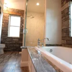 A custom bathroom with a separate shower and bathtub